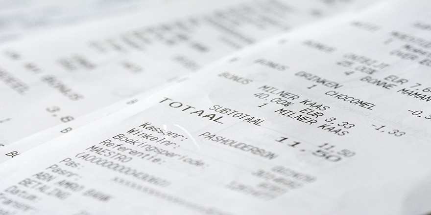 Close up on two store receipts